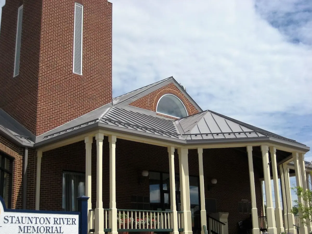 Skilled roofing craftsmen working on a residential roof in Seneca-Sun Valley